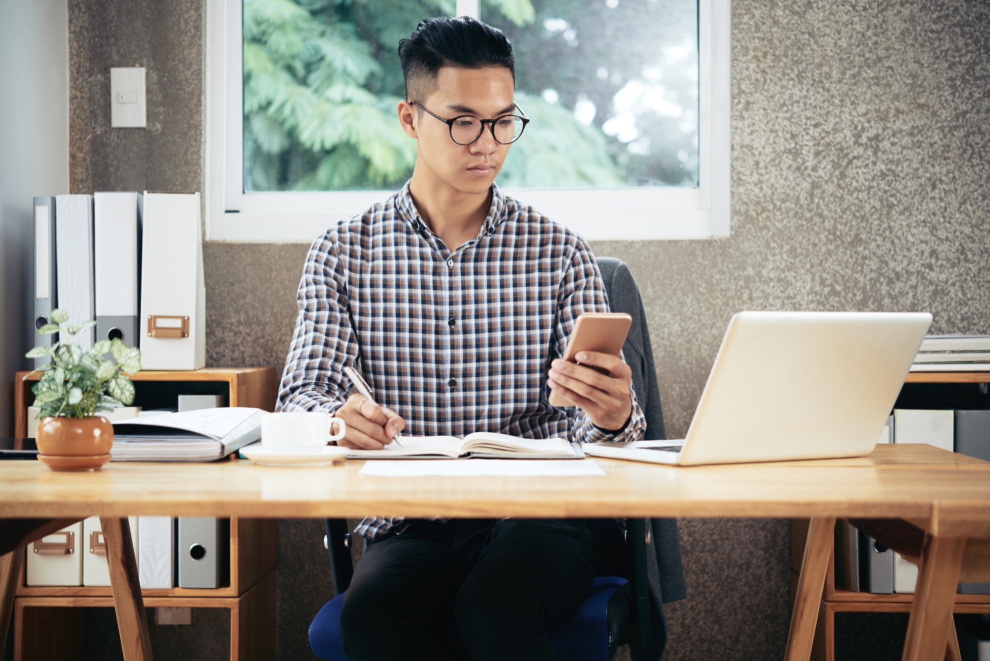 Entrepreneur Working at Office Desk