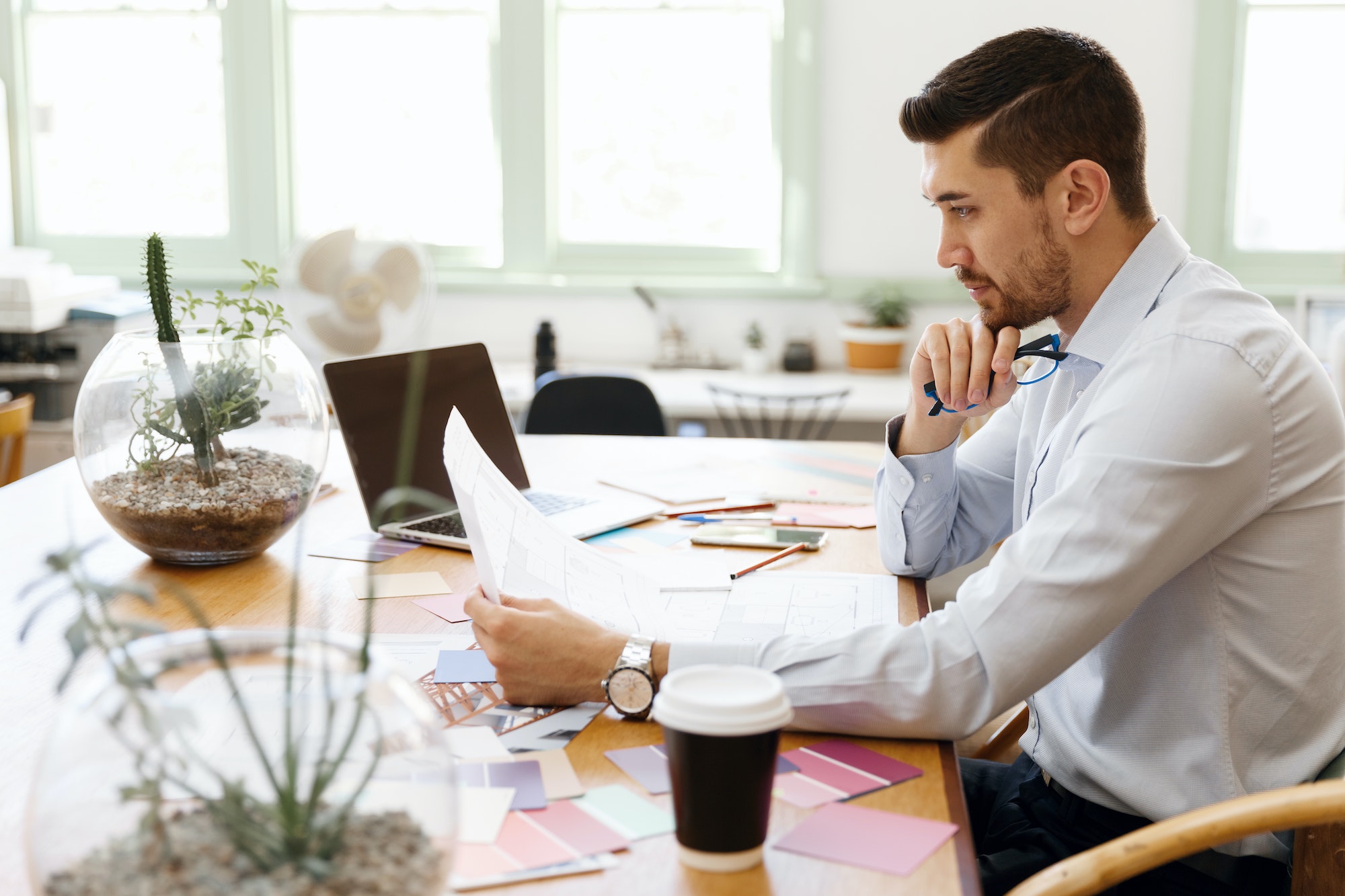 Young man architect in office